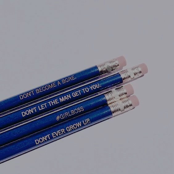 three blue pencils with the words don't let the man get to you written on them