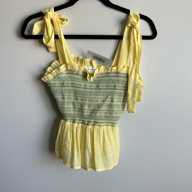 Super Cute On! Casual Fitted Smocked Top For Vacation, Fitted Casual Smocked Top For Vacation, Summer Drawstring Tops For Day Out, Summer Tops With Drawstring For Day Out, Chic Cotton Smocked Top For Beach, Casual Smocked Back Tops For Brunch, Casual Tops With Smocked Back For Brunch, Summer Smocked Beach Top, Yellow Smock Tops For Spring