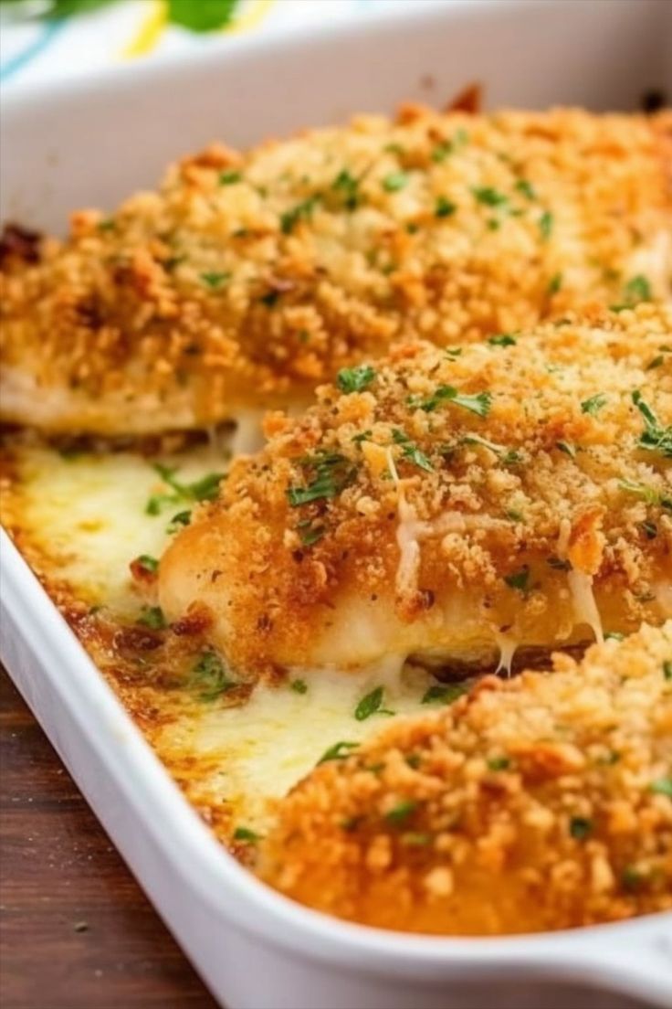 A delicious and flavorful dish that features juicy chicken breasts coated in a crispy parmesan crust. The chicken breasts are first seasoned with herbs and spices, then dipped in a mixture of grated parmesan cheese and breadcrumbs to create a crispy coating. Baked Chicken Recipes Bread Crumbs, Pesto Crusted Chicken, Parmesan Crusted Chicken Baked, Baked Garlic Chicken Breast, Parmesan Herb Crusted Chicken, Crispy Baked Chicken Breast, Italian Baked Chicken Breast, Baked Breaded Chicken Breast, Parmesan Baked Chicken