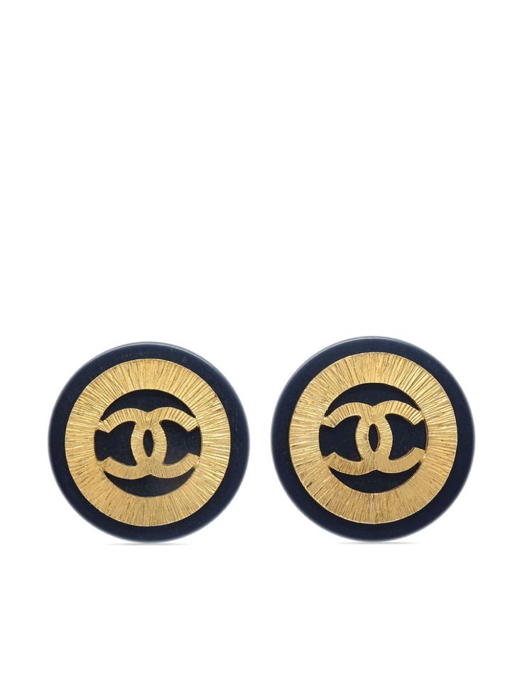 circa 1993 black gold plated signature interlocking CC logo circular design clip-on design These earrings come as a pair. Condition: GOOD. This previously owned and used item is in good condition with minimal signs of use. This may include fading of material or plating and scratches. Purchasing this item continues its narrative and reduces the environmental impact by avoiding the use of new resources needed to make the product from scratch, such as water, materials and electricity, and avoiding additional manufacturing impact. Learn more about what makes a product Conscious on our Conscious Criteria page Logo Circular, Shopping Chanel, Circular Design, Cc Logo, Environmental Impact, Earrings Gold, From Scratch, Clip On Earrings, Boho Chic