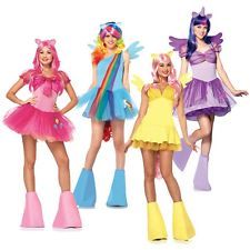 three little pony girls in costumes on the front page of a cell phone, with caption below