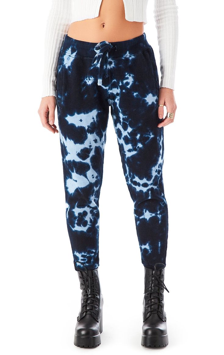 Watermark Tie Dye Sweatpants. This ultra-comfy tie dye sweatpant is meant to sit on the hip. with a soft ribbed hem. drawstring waist. with side & back pockets. Features a watermark tie dye pattern in navy and blue. Each garment is individually hand processed causing unique variations in tie dyes. Trendy Soft-washed Cotton Pants, Fall Acid Wash Relaxed Fit Pants, Blue Fall Sweatpants With Elastic Waistband, Acid Wash Relaxed Fit Pants For Fall, Blue Sweatpants With Elastic Waistband, Casual Acid Wash Relaxed Fit Pants, Casual Relaxed Fit Acid Wash Pants, Acid Wash Pants With Elastic Waistband And Relaxed Fit, Acid Wash Relaxed Fit Pants With Elastic Waistband