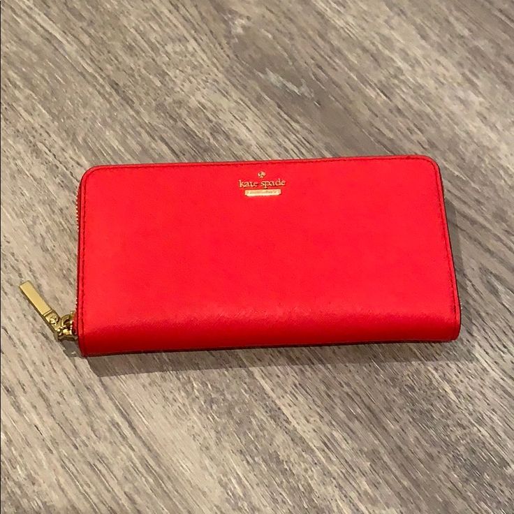 Brand New With Tag ( Ticketing Tag From Bloomingdale Retail Store) Zip Around Continental Wallet In Red Color Luxury Red Wallet With Zipper Closure, Luxury Red Wallets With Zipper Closure, Red Formal Wallet With Zipper Closure, Formal Red Wallet With Zipper Closure, Chic Red Wallet With Card Slots, Designer Red Wallet For Travel, Elegant Red Wallet With Interior Card Slots, Red Kate Spade Wallets For Everyday Use, Designer Red Wallet For Daily Use