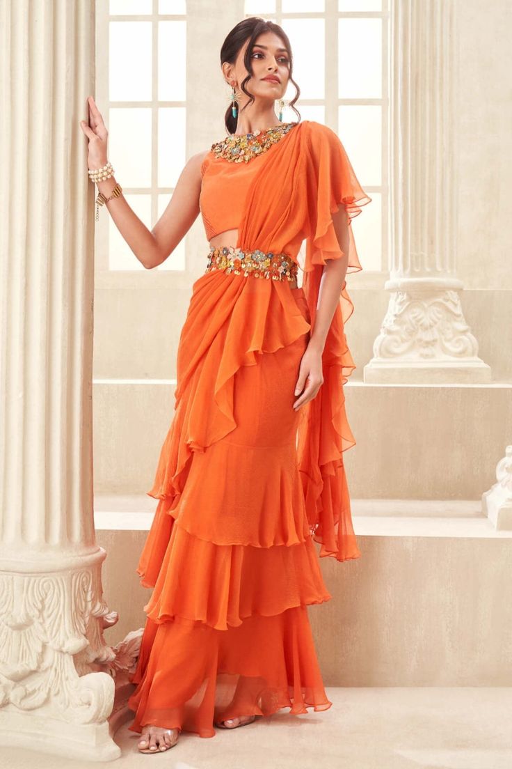 Orange pre-draped sari set – INDIASPOPUP.COM Tiered Saree, Pageant Wardrobe, Floral Work Blouse, Floral Cutwork, Indian Fits, Sleeveless Blouse Designs, Elegant Sarees, Saree Drape, South Indian Bridal Jewellery