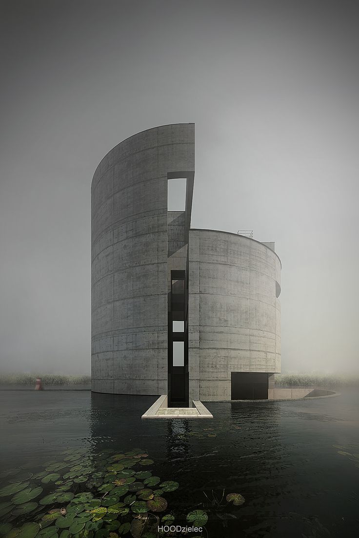 a large building sitting on top of a body of water