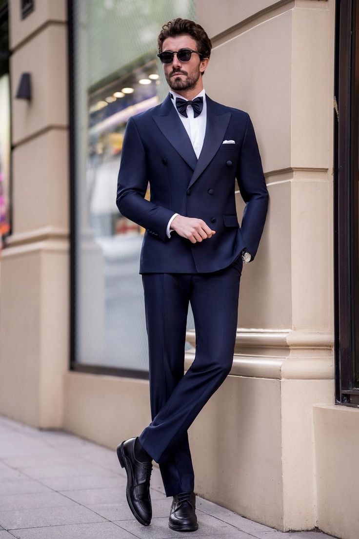 Step into a realm of midnight majesty with our Navy Double Breasted Tuxedo 2-Piece. This ensemble combines the deep allure of navy with the sophistication of a double-breasted cut, creating a look that exudes both confidence and grace. Ideal for black-tie events or grand celebrations, this tuxedo ensures you radiate elegance and poise.  #doublebreasted #navytuxedo #tuxedo #suit #suits #slimfit #menstyle #menfashion #fashioninspo Navy Blue Double Breasted Tuxedo, Mens Navy Blue Suit, Navy Blue Suit Men, Navy Blue Tuxedo, Suit For Men Wedding, Navy Suit Wedding, Navy Tuxedos, Navy Blue Tuxedos, Modern Fit Suit