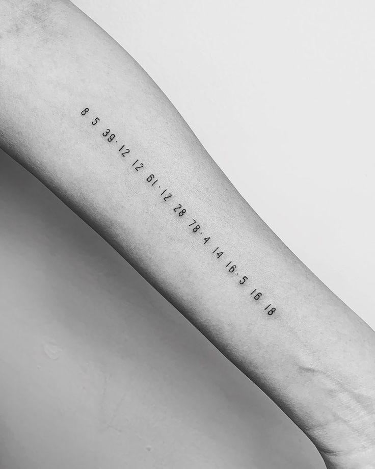 a person's arm with a quote on it