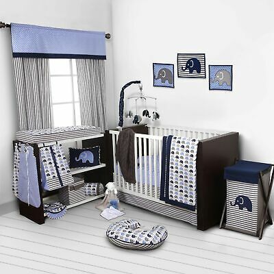 a baby's room with blue and white decor