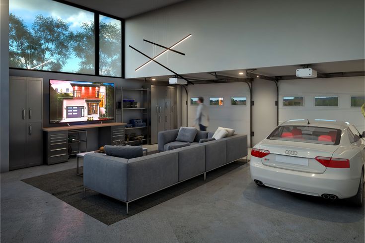 a car is parked in front of a tv and entertainment center inside a modern home