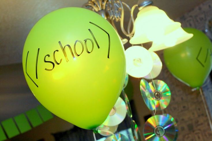 a green balloon with the word school written on it