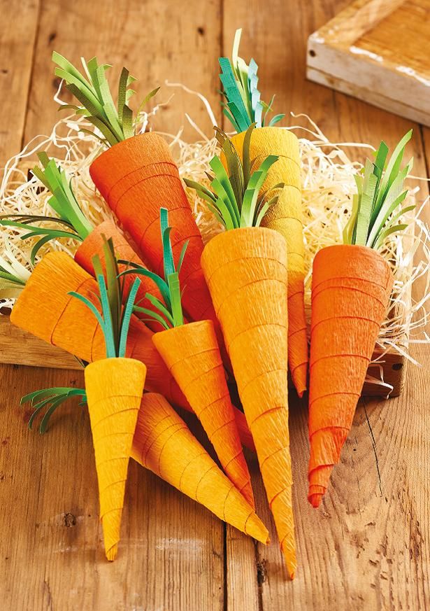 there are carrots that have been cut into small pieces and placed in a basket