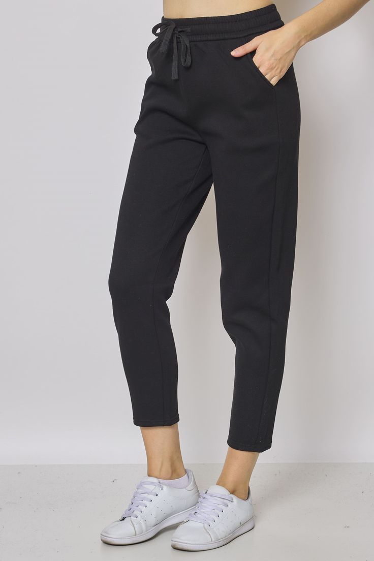 Description


Adopt a casual and stylish look with our tapered cut black jogging pants. These joggers offer the perfect blend of comfort and style for cool fall and winter days. Imagine yourself walking through the streets of Paris, wearing these jogging pants that elegantly hug your legs with their tapered cut. Wear it with a hoodie and sneakers for a comfortable and fashionable outfit during your casual outings. For a movie night or shopping trip, pair it with a basic tee and denim jacket for Relaxed Fit Ankle-length Joggers, Relaxed Fit Ankle-length Joggers For Jogging, Black Joggers With Ribbed Waistband For Fall, Black Tapered Leg Sweatpants In Athleisure Style, Fall Black Joggers With Ribbed Waistband, Black Tapered Leg Athleisure Sweatpants, Streetwear Tapered Leg Joggers With Elastic Panels, Streetwear Joggers With Elastic Side Panels And Tapered Leg, Solid Color Tapered Leg Joggers With Elastic Waistband