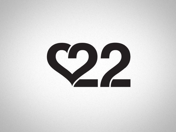 the number 22 is shown in black on a white background, and it appears to be two