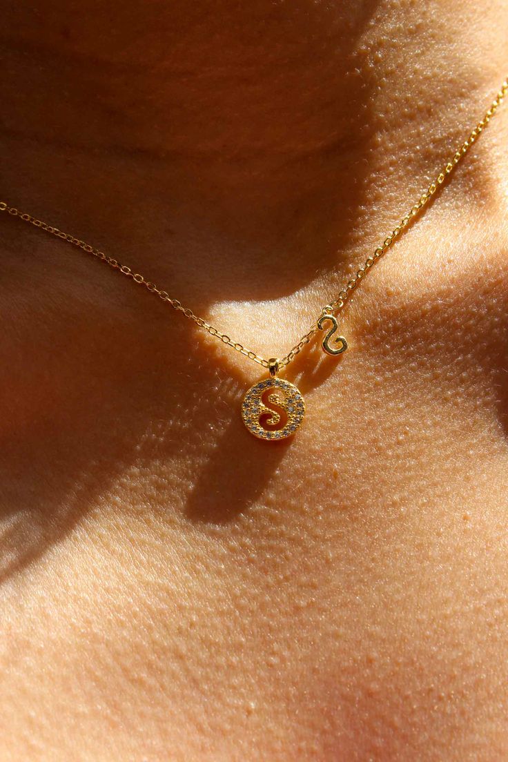 PRODUCT DESCRIPTION Elevate your gift-giving with our Round Initial Necklace – a delicate and meaningful accessory. The round pendant, engraved with a carefully chosen initial with a mini initial on the side, is a perfect way to celebrate and cherish the unique qualities of your special one. Initial Necklace Water Resistant 18k Gold-plated on 925 Sterling Silver 5A Grade Zircon Length: 39cm plus 6cm adjustable chain Read our full Jewellery Care Guide here Read our Sizing Guide here Elegant Initial Pendant Necklace As Gift For Her, Elegant Initial Necklace As A Gift For Her, Initial Pendant Charm Necklace As Gift For Her, Delicate Initial Pendant Necklace For Her, Delicate Initial Pendant Necklace As Gift For Her, Rose Gold Initial Necklace With Adjustable Chain, Initial Pendant Necklace With Adjustable Chain As Gift, Initial Round Pendant Necklace For Mother's Day Anniversary, Initial Round Pendant Necklace For Anniversary On Mother's Day