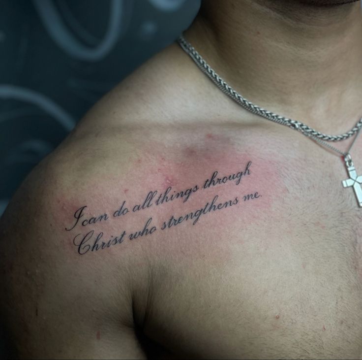 a man with a cross tattoo on his chest that says fear do all things through christ who straightens me