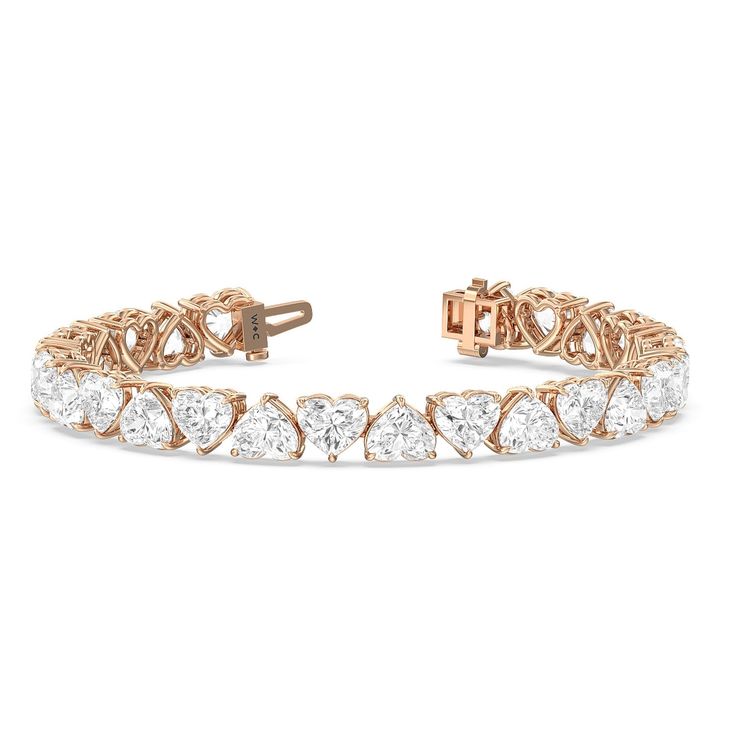 Prepare to be captivated by our exceptional Alternating North-South Heart Shape Tennis Bracelet. This bracelet is a work of art, combining the elegance of heart-shaped diamonds with a unique alternating orientation to create a piece that's not just jewelry but a symbol of love, charm, and timeless beauty.