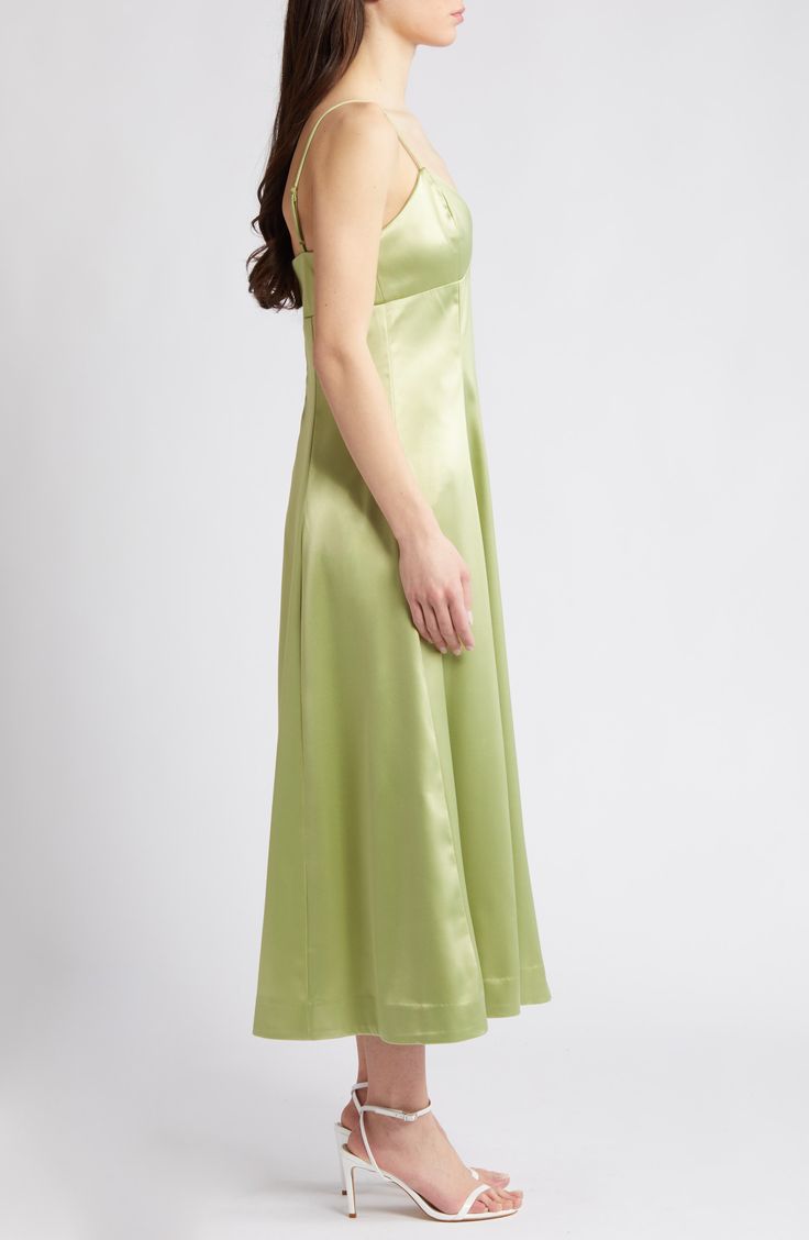 Glossy satin provides a graceful drape to this party-ready dress rendered in a fresh and verdant hue. 41" center front length (size Medium) Sweetheart neck Spaghetti straps 98% polyester, 2% elastane Dry clean Imported Green Satin A-line Dress, Elegant Green A-line Satin Dress, Green A-line Satin Dress, Green Fitted Satin Evening Dress, Green Satin Finish Fitted Evening Dress, Green Silk Evening Slip Dress, Green Silk Slip Dress For Evening, Green Satin Summer Evening Dress, Green Satin Finish Bridesmaid Dress