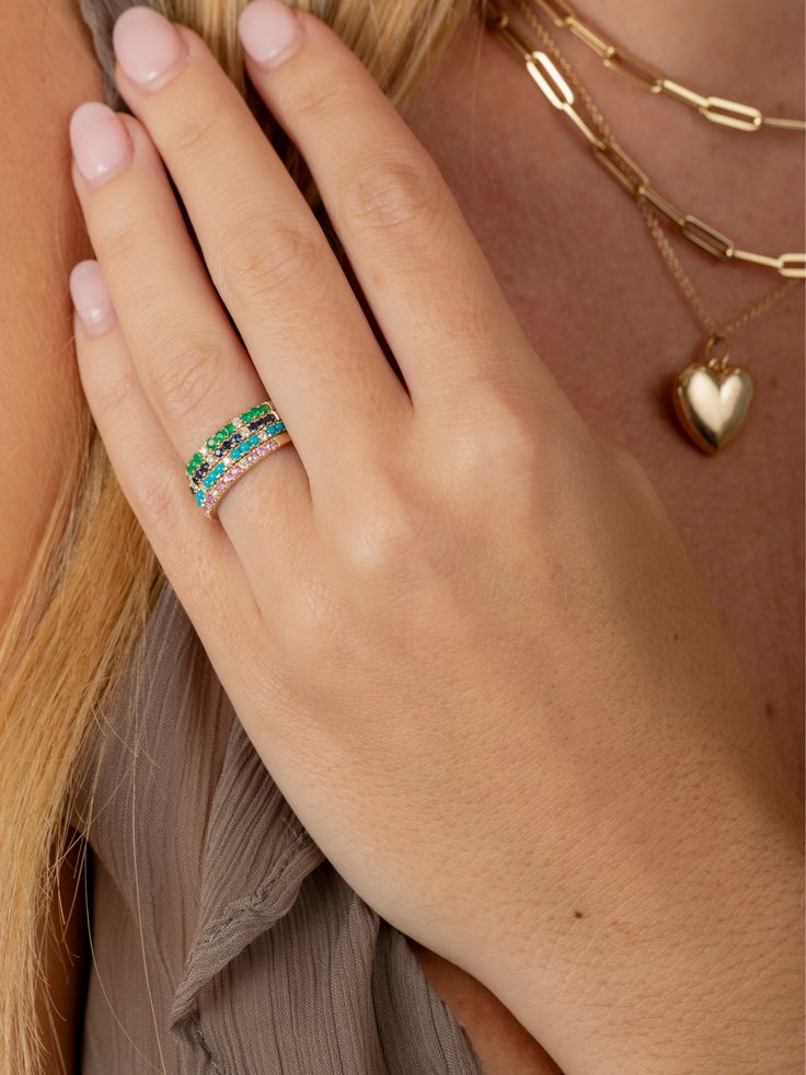 This halfway around turquoise band is substantial enough to stand out on it's own or mix with your current rings. It would be perfect for your right hand or stack however you see fit! There's nothing prettier than turquoise + gold (in our opinion)! Available in yellow gold and can be special ordered in white or rose gold. For other sizes and colors please email hello@shoplemel.com Turquoise Birthstone Ring In Fine Jewelry Style, Turquoise Birthstone Ring Fine Jewelry, Turquoise Emerald Open Ring For Anniversary, Turquoise Open Ring Emerald For Anniversary, Turquoise Fine Jewelry Ring For Promise, Turquoise Stackable Round Band Rings, Stackable Turquoise Ring In Fine Jewelry Style, Stackable Turquoise Ring Fine Jewelry, Turquoise Emerald Open Ring For Promise