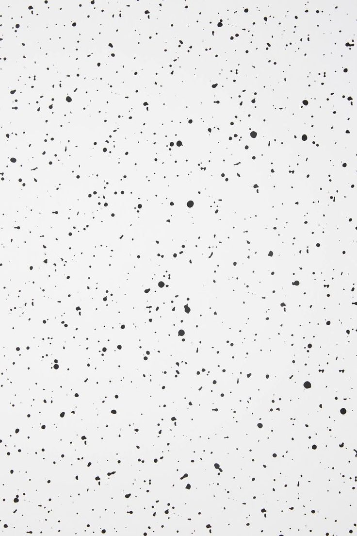 black and white speckles on a white background