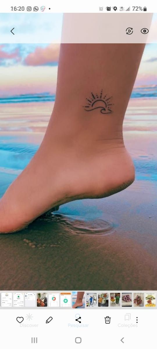 a person's foot with a small sun tattoo on the side of their ankle