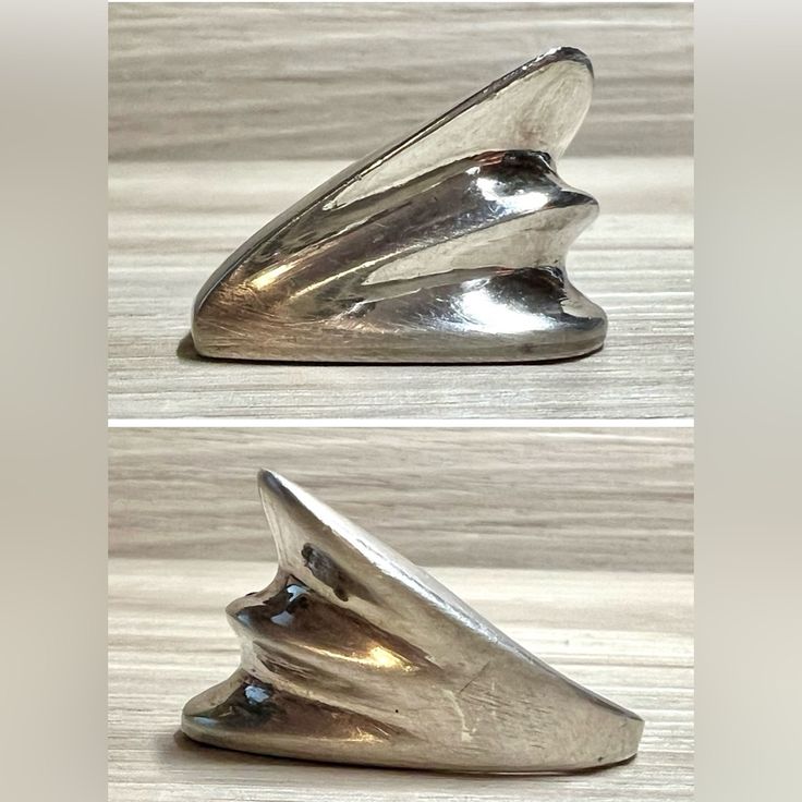 three different angles of a silver object