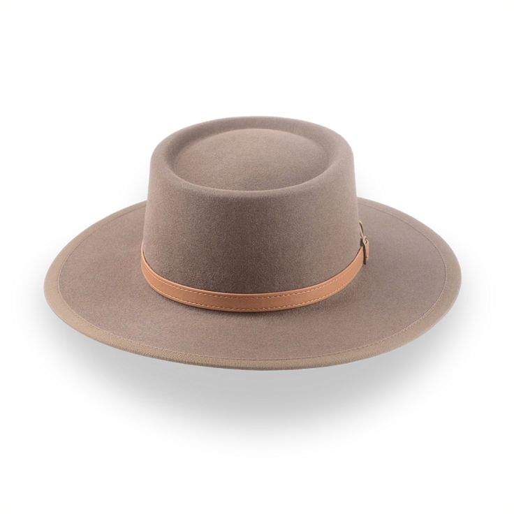 Description Materials Craftsmanship Hat Care Shipping Returns Product Description Taupe Brown Wide Brim Hat for Country Charm Embrace the spirit of the West with the Baron, a flat brim telescope cowboy hat crafted from premium bison fur felt. Designed for those who value tradition with a modern twist, this luxury hat features a unique telescope crown and a wide brim for maximum sun protection. Custom-fitted to your exact head measurements, The Baron offers a smooth finish, a grosgrain ribbon hat Cowboy Hat Crafts, Spanish Hat, Homburg Hat, Gambler Hat, Country Hats, Mens Hats Fashion, Fedora Hat Men, Luxury Hats, Homburg