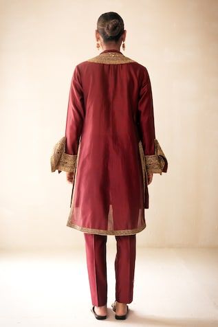 Maroon sheer kurta with cutdana, sequin embroidery on the yoke, cuffs and hem. Paired with a trouser and dupatta with floral embroidered border. Comes along with a slip. - Aza Fashions Designer Fitted Sherwani In Georgette, Fitted Georgette Sherwani For Designer Wear, Fitted Georgette Sherwani For Festive Occasions, Festive Georgette Sherwani With Dupatta, Festive Fitted Georgette Sherwani, Festive Elegant Sherwani With Sheer Dupatta, Silk Dabka Kurta For Reception, Elegant Festive Cotton Silk Sherwani, Traditional Silk Sherwani With Mirror Work