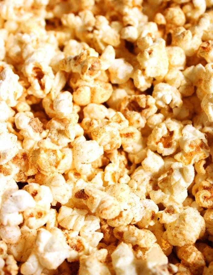 a close up view of popcorn kernels on a table