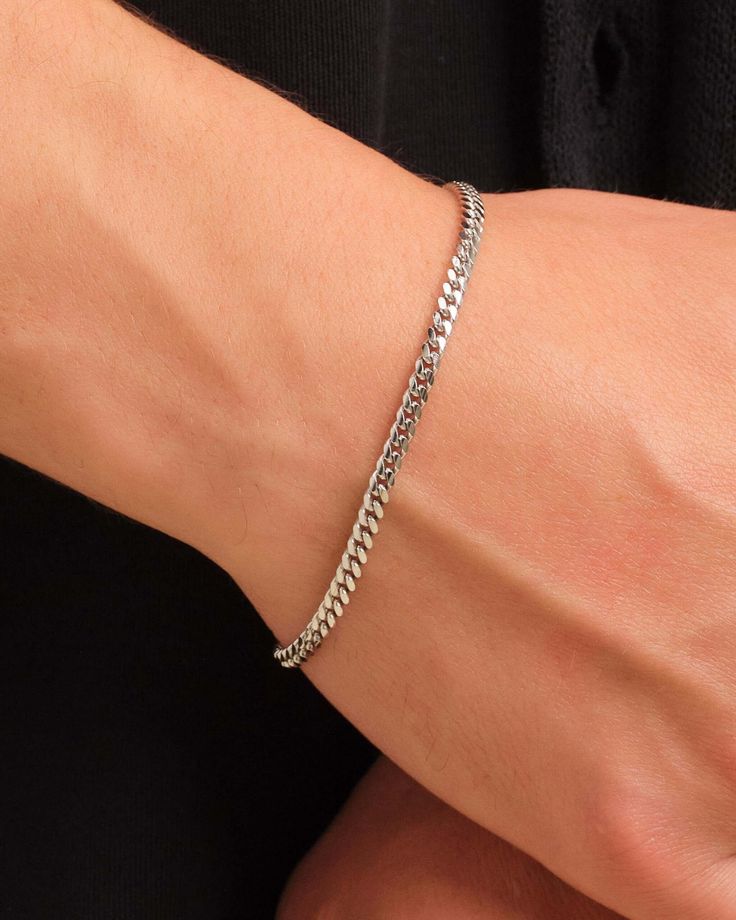 Our men’s silver 3mm Cuban Link Bracelet is the everyday bracelet your jewelry collection needs. This Italian-made 925 sterling silver men’s bracelet is meant for layering or for understated style. Pair with the 3mm Cuban Link Chain for a winning combination. JAXXON 3mm Cuban Link Silver Bracelet | 8.5" Mens Silver Bracelets, Men Silver Bracelet, Cuban Chain Men, Cuban Link Bracelet, S Bracelet, Understated Style, Everyday Bracelet, Mens Bracelet Silver, Solid Gold Chains