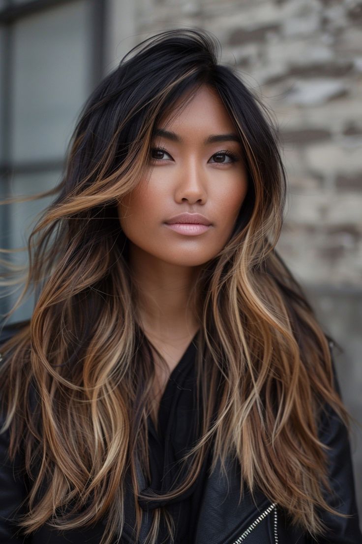 Step into the world of caramel balayage hairstyles - a chic and adaptable choice to enhance all hair textures. No matter if you have luscious dark curls, sleek brunette locks, or edgy black strands, caramel highlights add a touch of luminosity. Embrace this trend across various lengths - from sassy bobs to cascading waves - for a flawless, effortless finish. Shag Ombre Hair, Dark Balayage Hair Long Layered, Black Hair To Brown Balayage, Carmel Brown Balayage Hair On Black Hair, Long Brunette Hair With Layers Balayage, Dark Balyage Long Hair Brunettes, Fall Hair Color For Brunettes Caramel Low Lights Dark Brown, Brown Bayalage 2024, Balayage Shag Hair