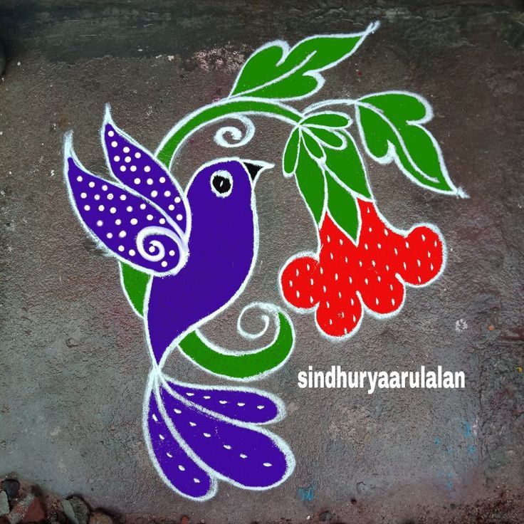 a colorful bird painted on the side of a cement wall with leaves and berries around it