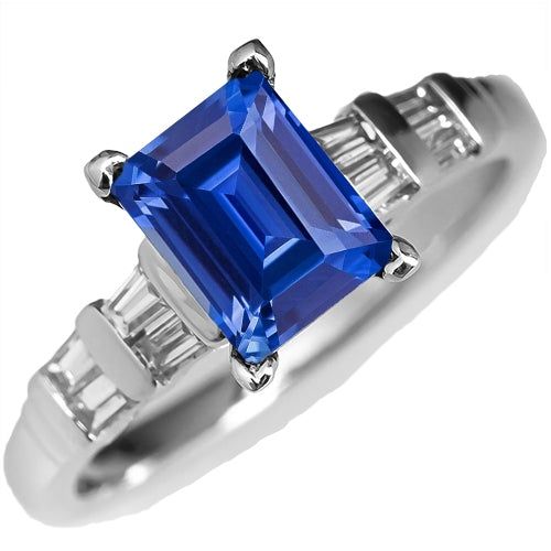 METAL SPECIFICATIONS White Gold 14K STONE SPECIFICATIONS Stone Name : Blue Sapphire and Diamond Stone Cut : Emerald and Baguette Stone Details : There is one emerald cut sapphire approx. 2 carats (Approx. Size 8 x 6 mm) and approx. 1 carat of diamonds on the sides. Natural earth mined stones. Color : G Clarity : VVS1 Quality of Sapphire : AAA Sapphire Treatment : Heated Total : Approx. 3 Carats RING SPECIFICATIONS Size : 6.5 (Can ship in any size, please send us a message about size after placin 3 Carat Ring, Ceylon Sapphire Ring, Ceylon Sapphire, Baguette Diamonds, Natural Earth, 3 Carat, Baguette Diamond, 2 Carat, Diamond Stone