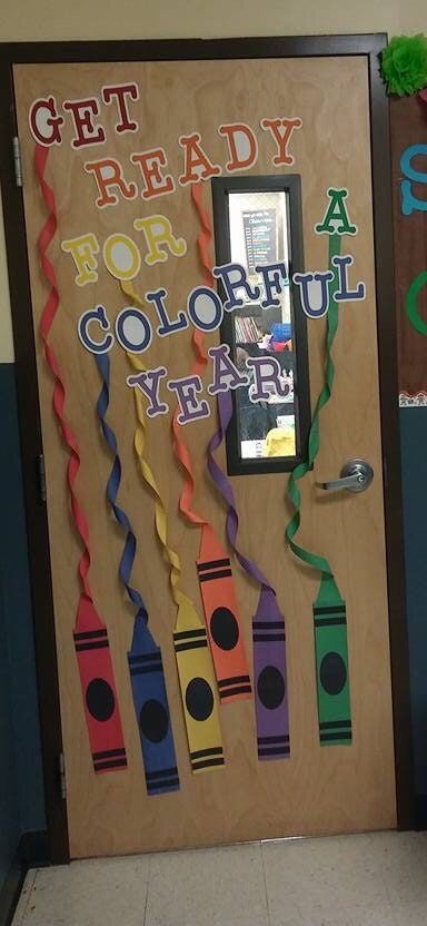 a classroom door decorated with colorful streamers