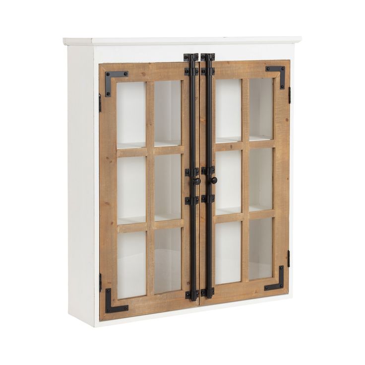 a wooden cabinet with glass doors and black handles