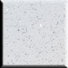 a white wall with small drops of water on the surface and black frame around it