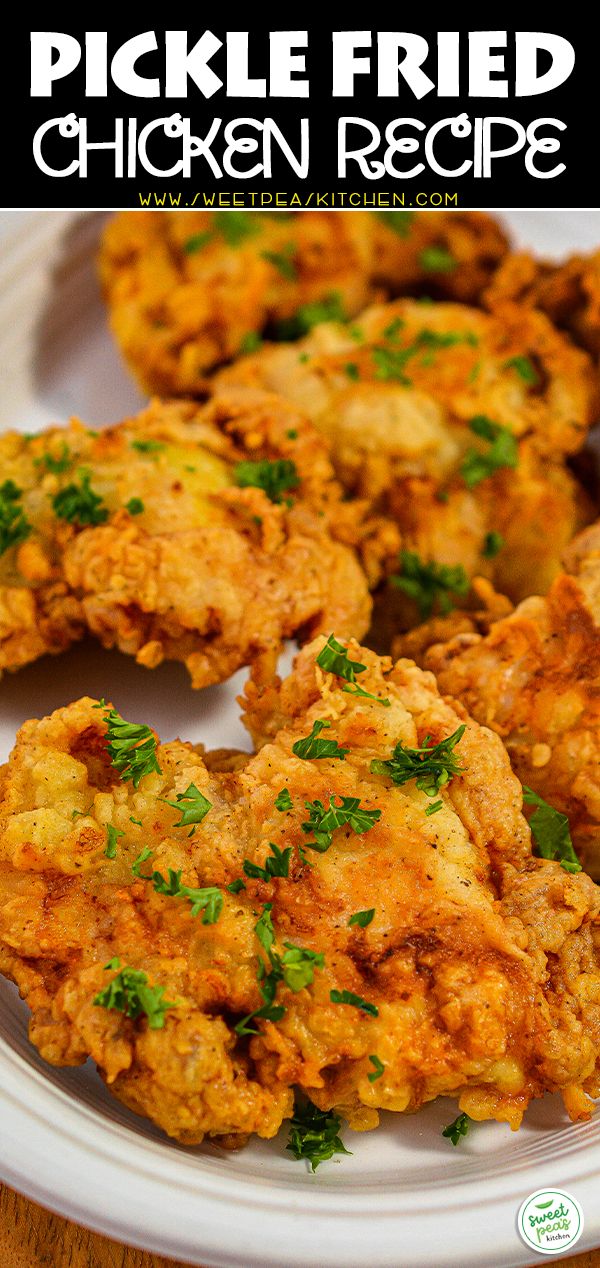 fried chicken recipe on a white plate with parsley