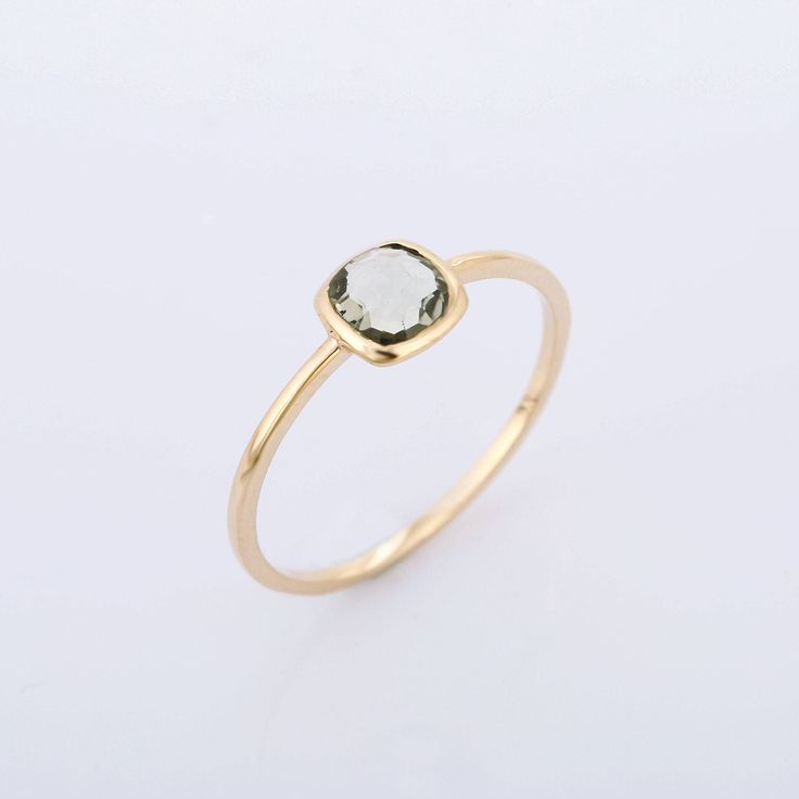 We have Different variety of ring. This unique solitaire ring one of them our beautiful jewelry collection. It will be useful for people born in February month.PRODUCT DETAILSMaterials - 14K Yellow Gold Gemstone - Green AmethystGemstone Shape - CushionGemstone Size - 5.50 mmGemstone weight - 0.55 ctGross Weight - 1.0 GrmShank Width -1.10 mmSetting type - Bezel setting The rings can be made in any size and any gemstone. Customisation available Spiritual Gemstone Rings For Anniversary, Spiritual Yellow Gold Crystal Ring With Gemstone, Timeless Citrine Gemstone Jewelry, Citrine Birthstone Jewelry In Round Cut, Citrine Birthstone Jewelry Round Cut, Classic Citrine Gemstone Jewelry, Timeless Citrine Jewelry As Gift, Timeless Citrine Jewelry For Gift, Spiritual Yellow Gold Birthstone Ring Gift