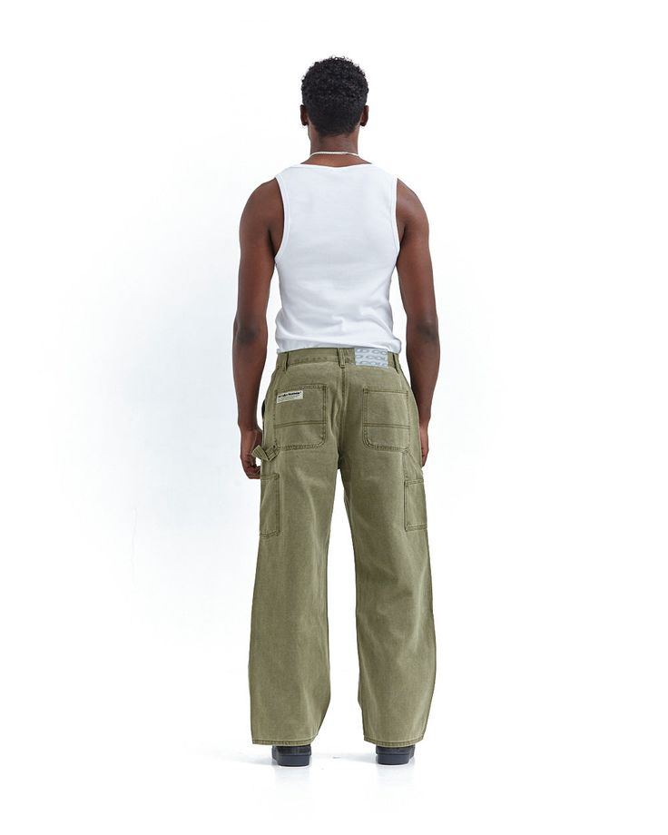 Straight loose fit pants. Stone-washed green canvas. 100% heavy cotton fabric. Zipper closure with Cold engraved on button. Triple stitch. Double Knee Reinforcement. Tool pockets and hammer loop. Male (182cm, 5'11"): M - National Shipping 24-48H (Spain / Portugal) - CORREOS EXPRESS - European Shipping 48-72H - FEDEX - International Shipping 5-7 working days - FEDEX