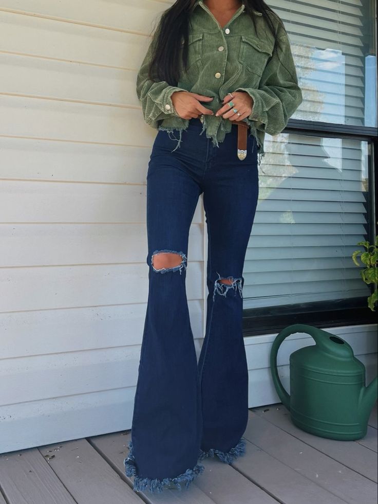 Dark wash trending denim, distressed hem and knee slits Mid State Fair Outfit, Dark Bell Bottom Jeans Outfit, Cowgirl Boots Outfit Fall Jeans, Bell Bottom Jeans Outfit Aesthetic, Boots And Jeans Outfit Cowgirl, Western Flare Jeans Outfit, Trendy Western Outfits For Women, Women’s Western Fashion, Country Concert Outfit Cold Weather