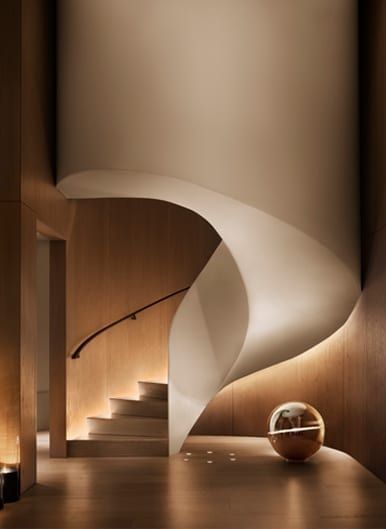 the interior of a modern house with stairs