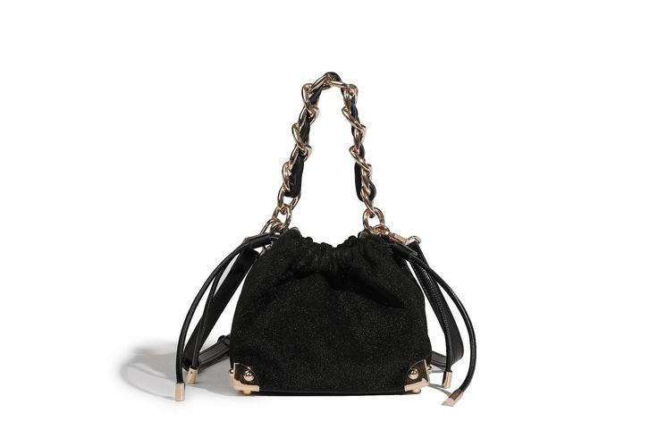 The Chic-Chain Velvet Crossbody Bag, a statement accessory for the modern fashionista. This exquisite black bag features a luxurious velvet texture complemented by a striking gold-tone chain handle, adding a touch of glamour to any ensemble. The drawstring closure ensures your essentials are securely stored, while the versatile crossbody strap offers convenience and style. Perfect for both day and night, this bag effortlessly combines elegance with functionality, making it an essential addition to your accessory collection. Velvet Texture, Black Bag, Black Cross Body Bag, Day And Night, The Chic, Crossbody Strap, Haiti, Chain Styles, Packing List