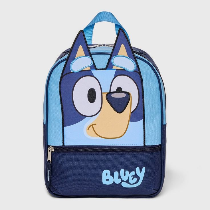 Let your little one carry their essentials in style with the Toddler Bluey Backpack in Blue. Designed with front zippered pocket that provides additional organization, two water bottle holders and adjustable shoulder straps ensuring a comfortable fit. Crafted with durable woven material which makes this backpack a perfect accessory to add to your little one’s everyday adventures. Cute Blue Backpack For Travel, Cute Blue Travel Backpack, Blue Outdoor Softback Bags, Blue Softback Bags For Outdoor, Blue Softback Bags For Outdoor Use, Blue Softback Bag For Outdoor, Cute Blue Backpack For Back To School, Cute Blue Backpack With Zipper Closure, Blue Functional School Backpack