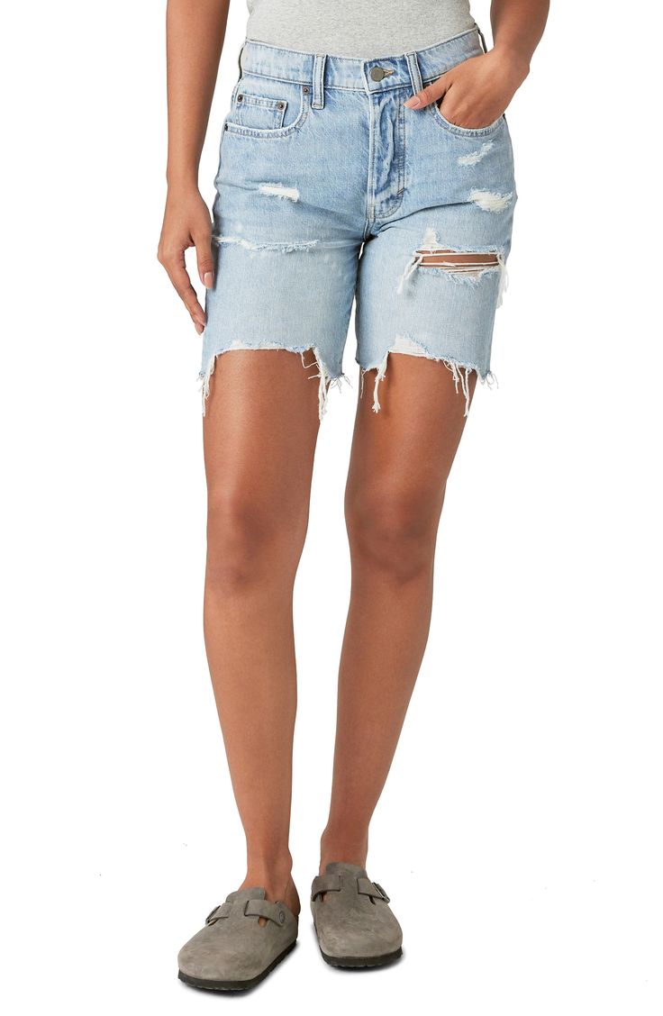 Rock a laid-back, '90s-inspired look in these mid-thigh cutoff shorts made from shredded low-stretch denim. 7" inseam 90% cotton, 10% linen Machine wash, tumble dry Imported Casual Distressed Cutoff Jean Shorts, Mid-rise Distressed Jean Shorts For Summer, Distressed Medium Wash Jean Shorts, Relaxed Fit, Distressed Light Wash Cutoff Shorts, Relaxed Fit Distressed Medium Wash Jean Shorts, Light Wash Distressed Cutoff Shorts, Casual Ripped Cutoff Shorts, Summer Cotton Bermuda Shorts With Mid-thigh Length, Summer Cotton Bermuda Shorts Mid-thigh Length