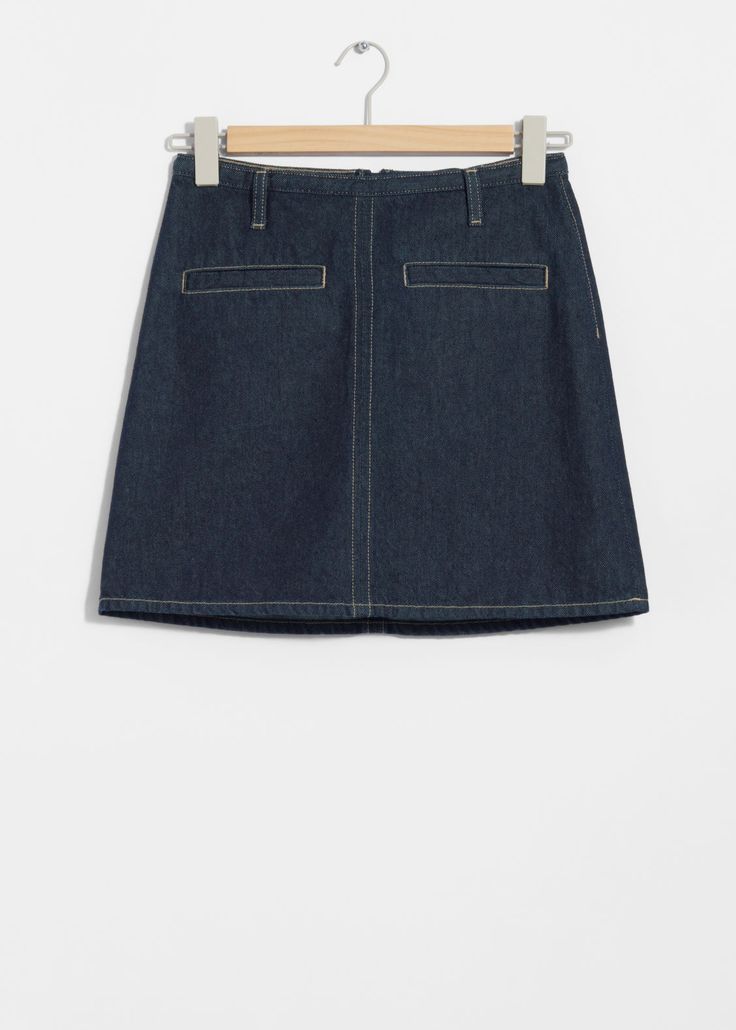 Denim mini skirt detailed duo welt pockets at the front, belt loops and topstitched detailing. Fastened with a zipper at the back.Length of skirt:43cm / 16.9" (EU 36 / UK 8 / US 4) Mini Skirt Jeans, Denim Blue Cotton Mini Skirt, Dark Wash Cotton Denim Mini Skirt, Luxury Cotton Mini Denim Skirt, Luxury Denim Blue Mini Skirt, Non-stretch Denim Blue Mini Skirt, Seven Jeans, Skirt Jeans, Suit Jumpsuit