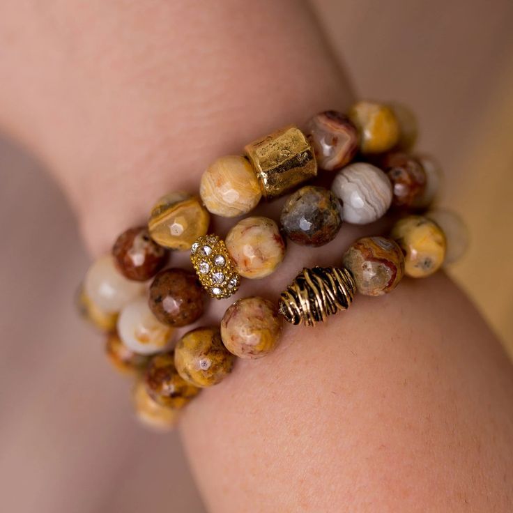 Add a touch of nature to any outfit with this unique stack of beaded bracelet designed and handmade in the South featuring semi-precious gemstones and gold accents. Each stack is carefully put together with perfect color combinations to accent the stones best features. Pair it with jeans and your favorite top for all day style. One size fits most. Stretches slightly for a comfortable fit. Handmade in Jacksonville, Florida Each of our designs are hand crafted and may vary slightly.