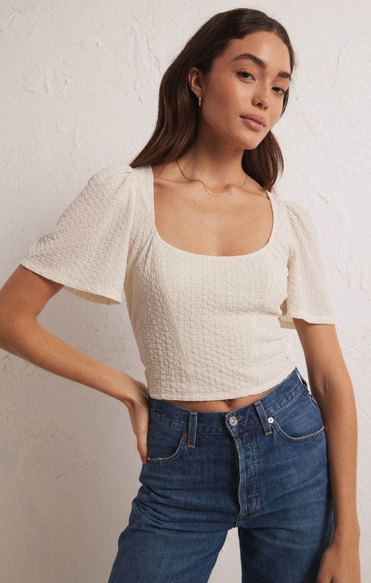 Z Supply Women's Ribbed Novelty Knit Top Maxine Knit Top Introducing the Maxine Knit Top: a square neckline top crafted from textured knit fabric for a bold look. Featuring short flowy sleeves and a waist length, this top is sure to turn heads and is perfect for any occasion. Shop more from Z Supply here. Details Available in sizes XS-L Color: Sandstone or Black Textured knit fabric Square neckline Short flowy sleeves Waist length Fabric 93% Polyester, 7% Spandex Sizing XS: 0-2, S: 4-6, M: 8-10, Textured Tops Women, Square Neckline Top, Moroccan Oil Hair, Shooting Ideas, Rib Knit Top, Long Sleeve Outerwear, Day Spa, Flowy Sleeves, Ribbed Knit Top