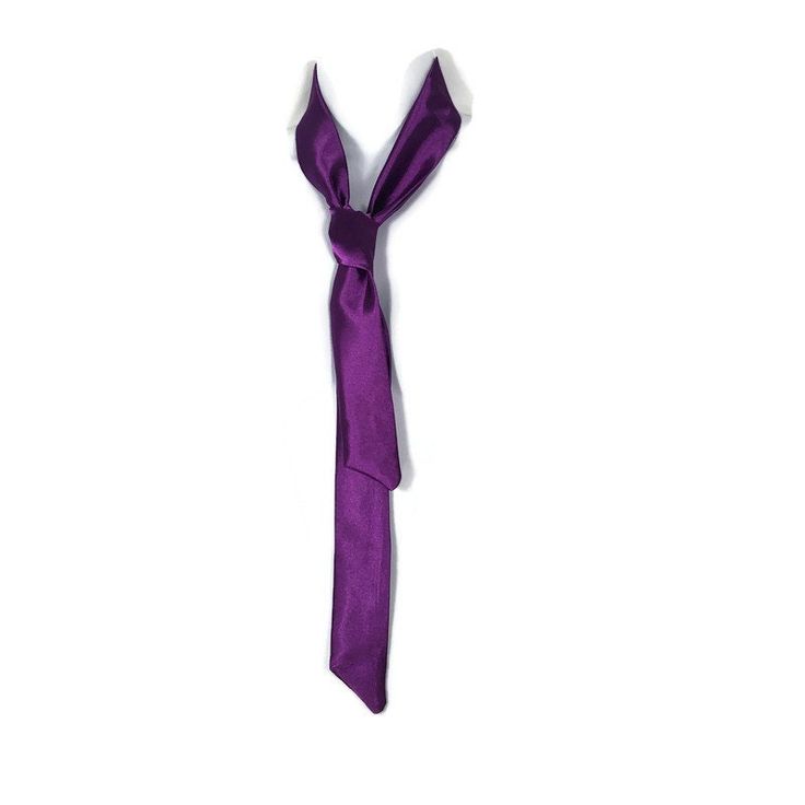 "Purple Skinny Tie Purple Charmeuse Necktie Shiny Neckties Purple Satin Skinny tie Women Purple Ties Women Satin Sashes Purse Scarves Satin Zoom in with this purple charmeuse skinny necktie. High end satin charmeuse fabric is doubled then sewn...no raw edges or exposed seams Wear around your neck, tucked into a blouse or jacket...combine with necklaces Wear around your neck tied into a bow Wear hanging from a purse...or wear as a sash...so versatile Approximate Measurements: 48-49\" long x 1.5\" Goth Hat, Purple Ties, Corp Goth, Collage Pics, School Ties, Trio Halloween Costumes, Black Confetti, Purple Accessories, Charmeuse Fabric