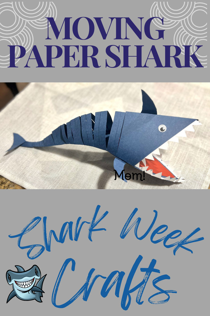 a shark made out of paper sitting on top of a white napkin with the words moving papershark