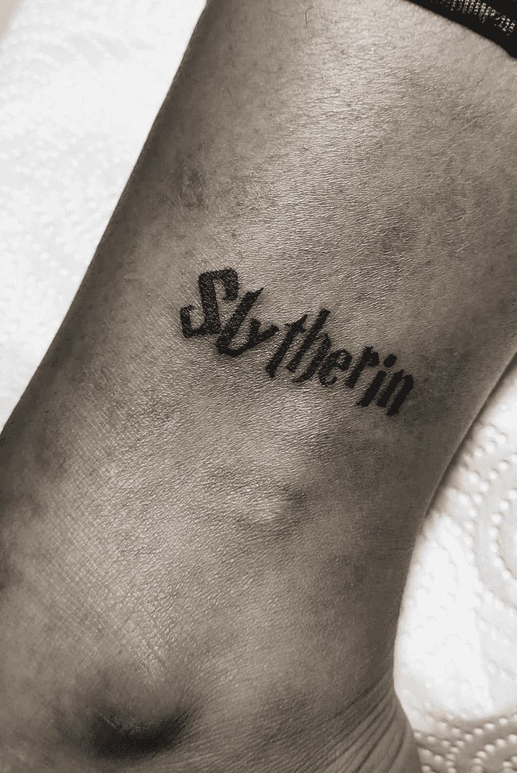 a black and white photo of a woman's foot with the word stephen on it