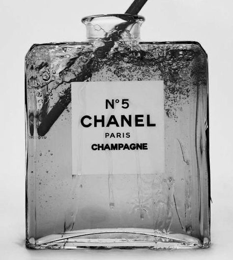 chanel no 5 perfume bottle in black and white with the label's name on it